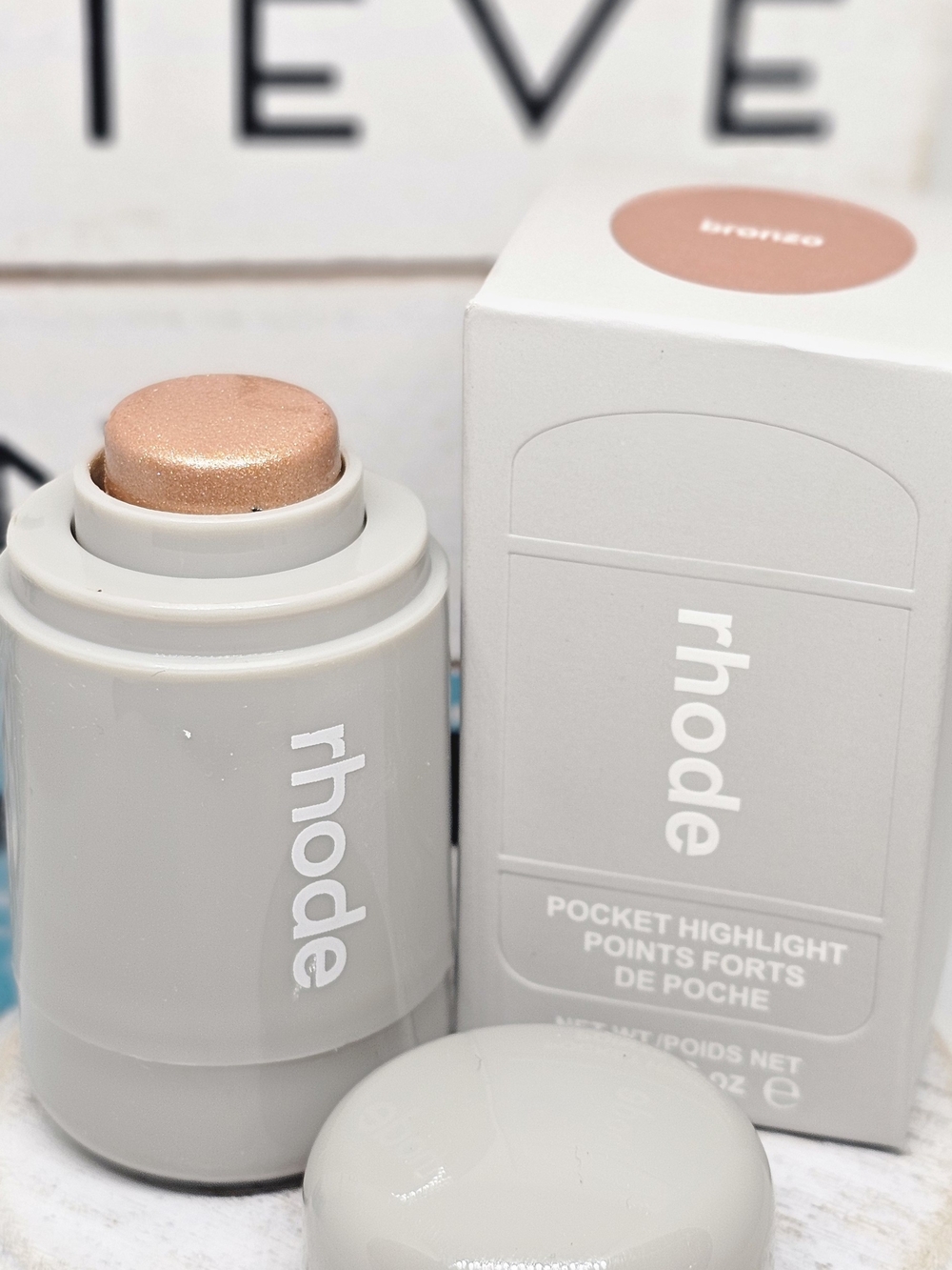 RHODE Pocket Highlighter Stick in Bronze Peach